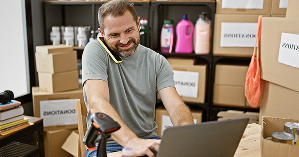 Nonprofits – person scanning items in a warehouse