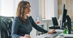 Commercial – professional working at desktop computer